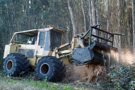 The Barko chipper attaches to wheel loaders. It is an impressive machine, and very loud.